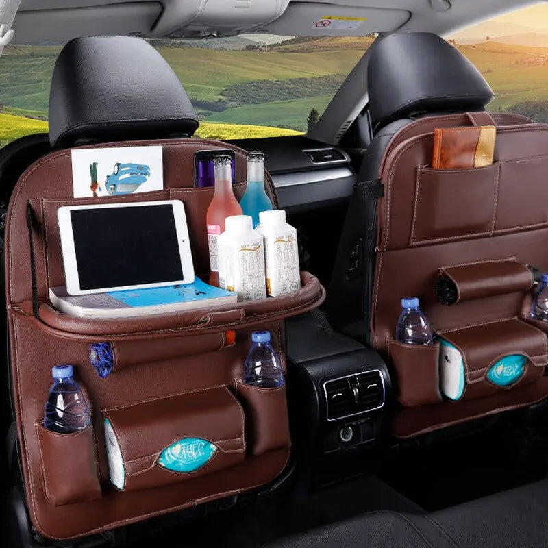 "Transform your back seat with our Stylish Car Seat Back Organizer! 🚗✨ Featuring a Foldable Table Tray and Plenty of Pockets for all your travel needs. Keep your ride tidy and stylish! #CarEssentials #RoadTripReady"